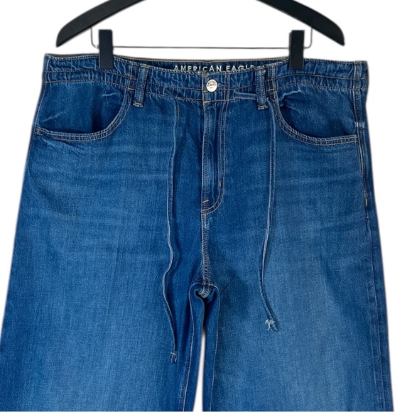 American Eagle Dreamy Drape Strigid Low-Rise Ultra Wide-Leg Jean size 12 Belted - Picture 4 of 9